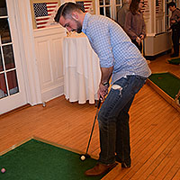 An Individual Player at Mini Golf